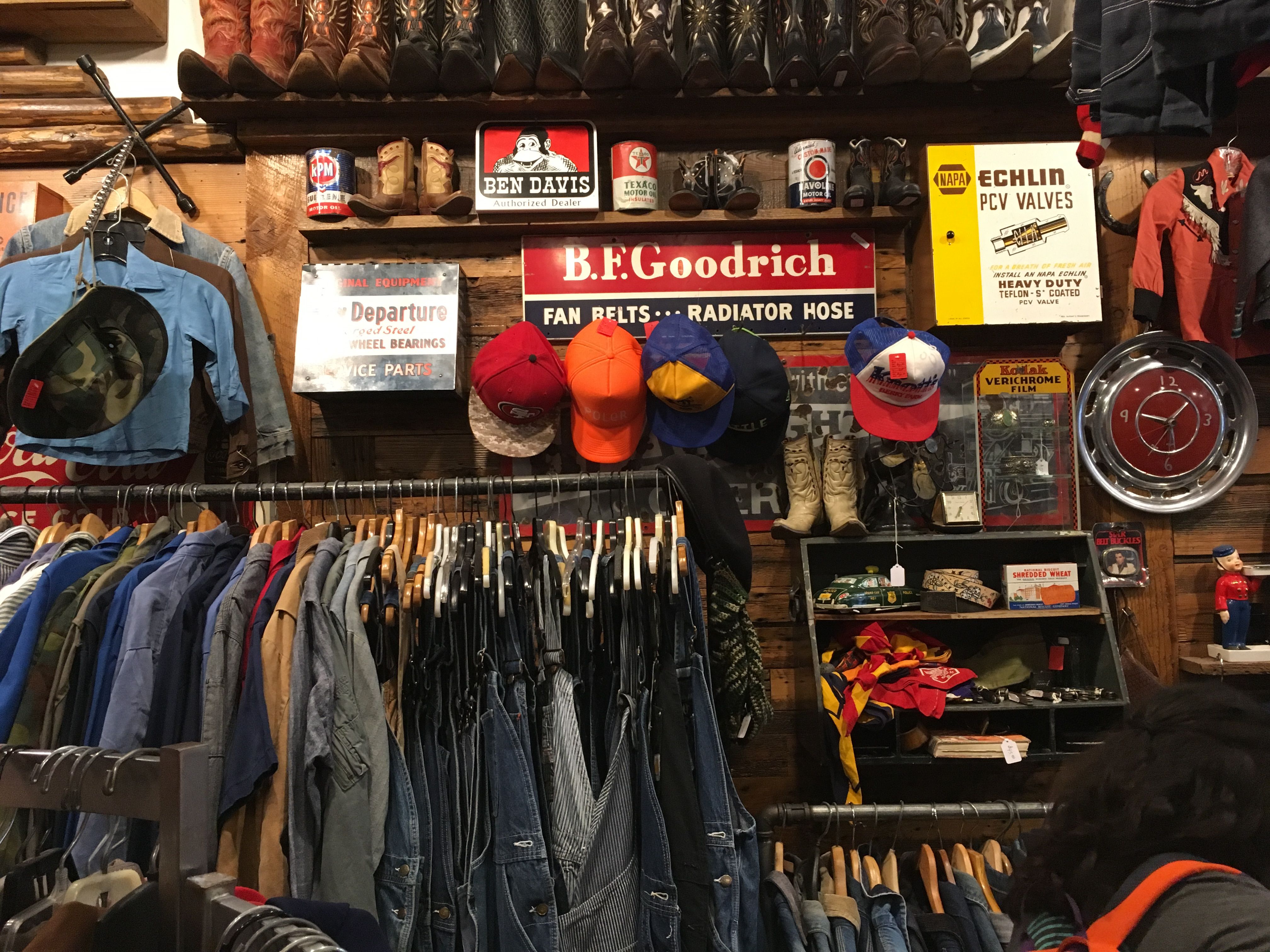 Vintage clothing store with racks of clothes and accessories